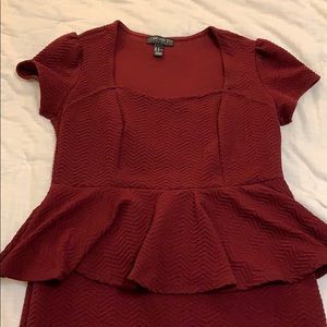 Textured burgundy peplum body con dress